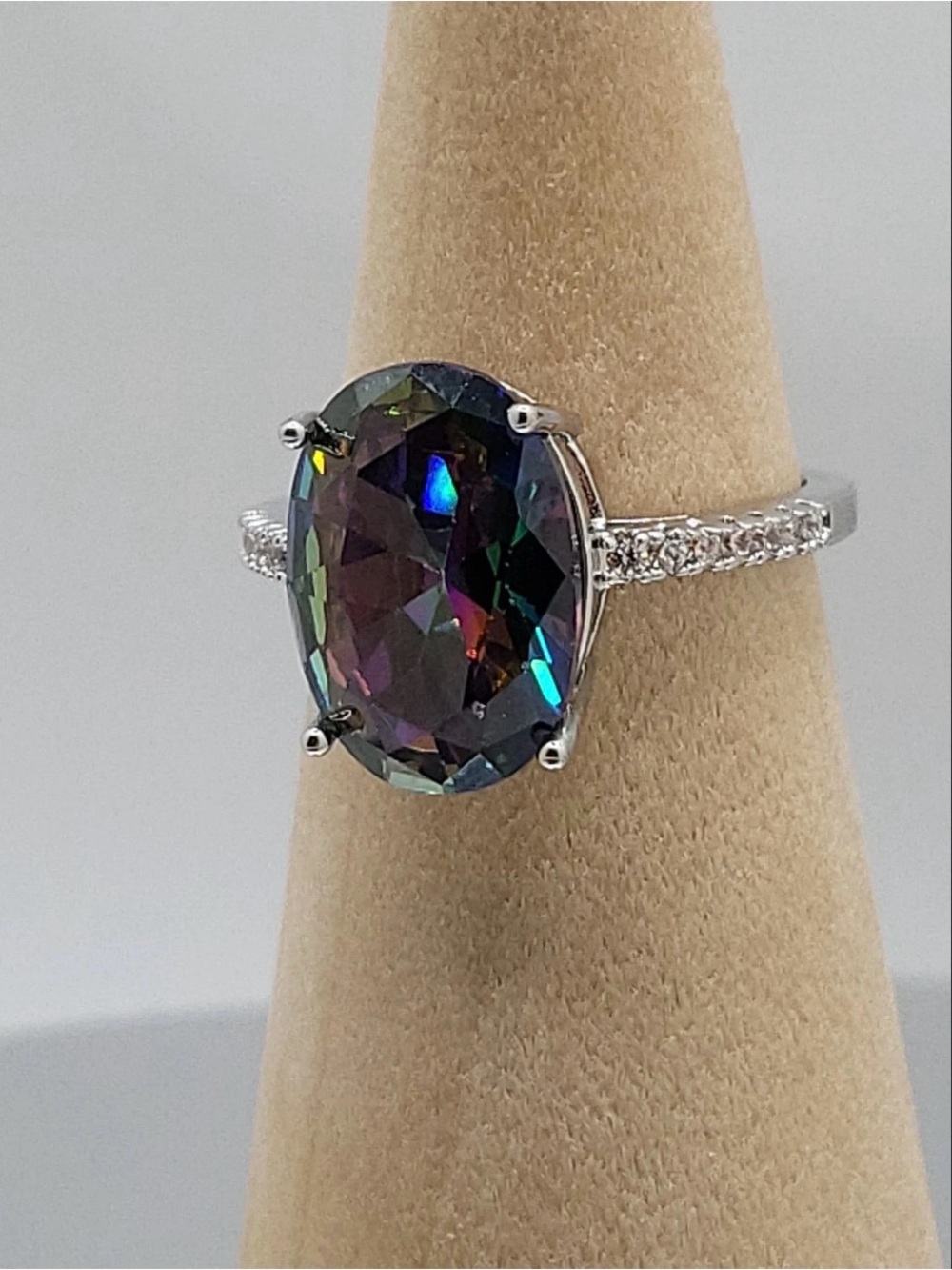 White Gold Plated Mystic Topaz Oval Solitaire Ring in Multi-Colour with CZ Band. - Picture 4 of 8